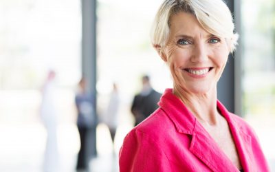 beautiful middle aged businesswoman in modern office
